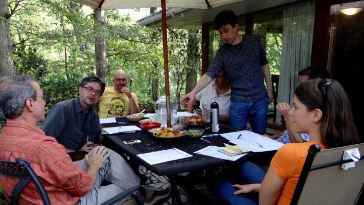 The judges for the beers in group A. Hans waxes eloquently on mouthfeel to an enraptured audience, while Josh reaches for a chip.