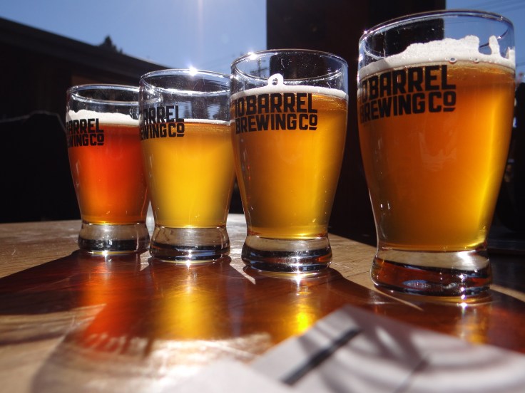 A flight of fresh hopped IPAs at 10 Barrel Brewing Co.