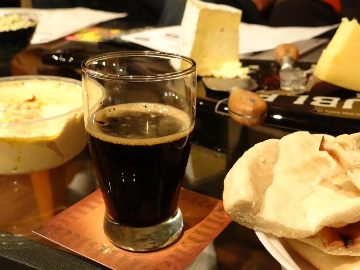 As if there weren't enough calories in a 12% abv stout, why not throw in some rich buttery cheese and pita bread.