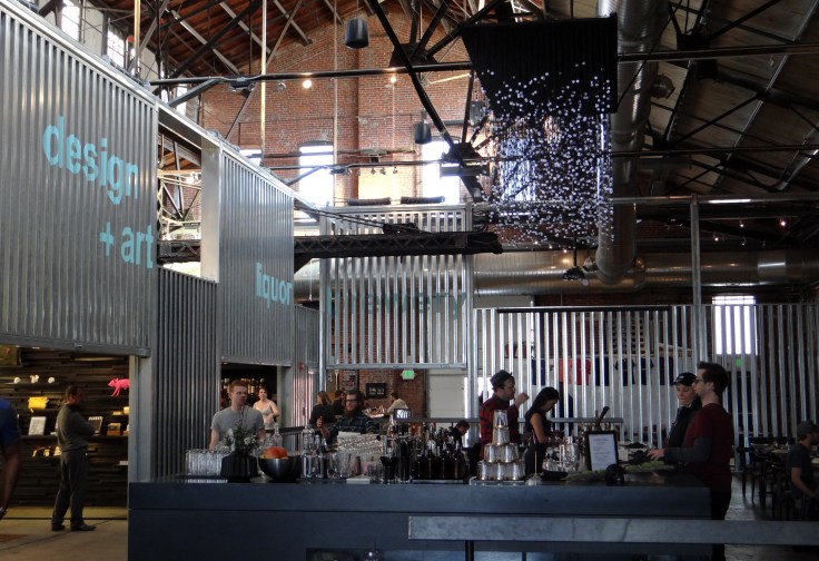 Liquor in the front and beer in the rear.  Crooked Stave takes up the left rear corner of The Source.