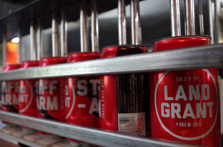 The canning line fills five cans at a time a process it repeats six times a minute.